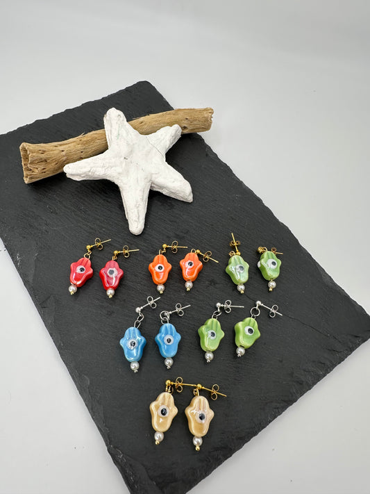 Pendientes mano