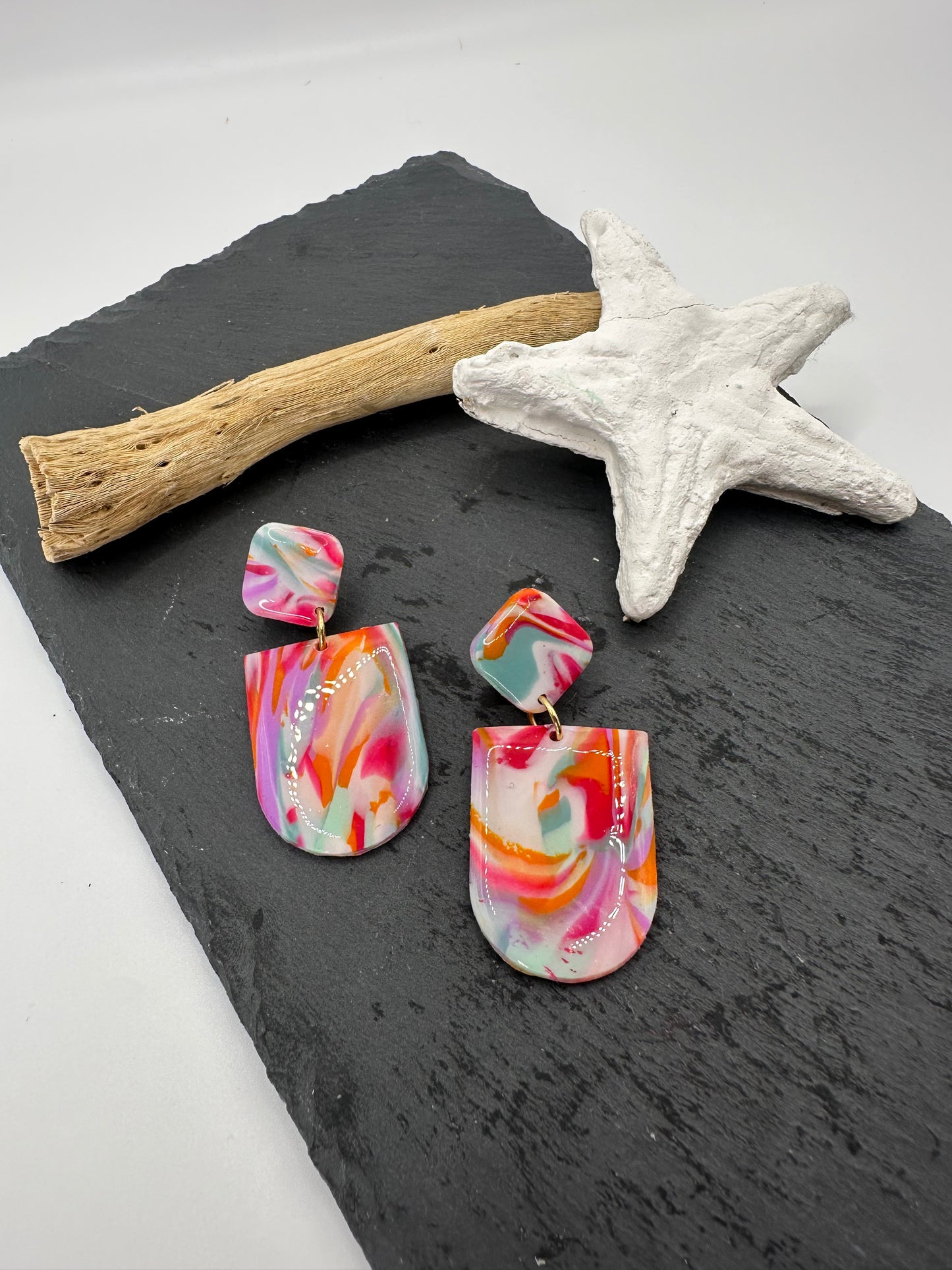 Pendientes asimétricos